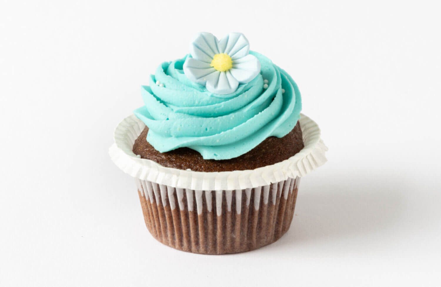 Bergen Kantinetjeneste - Sjokoladecupcake med blå blomst