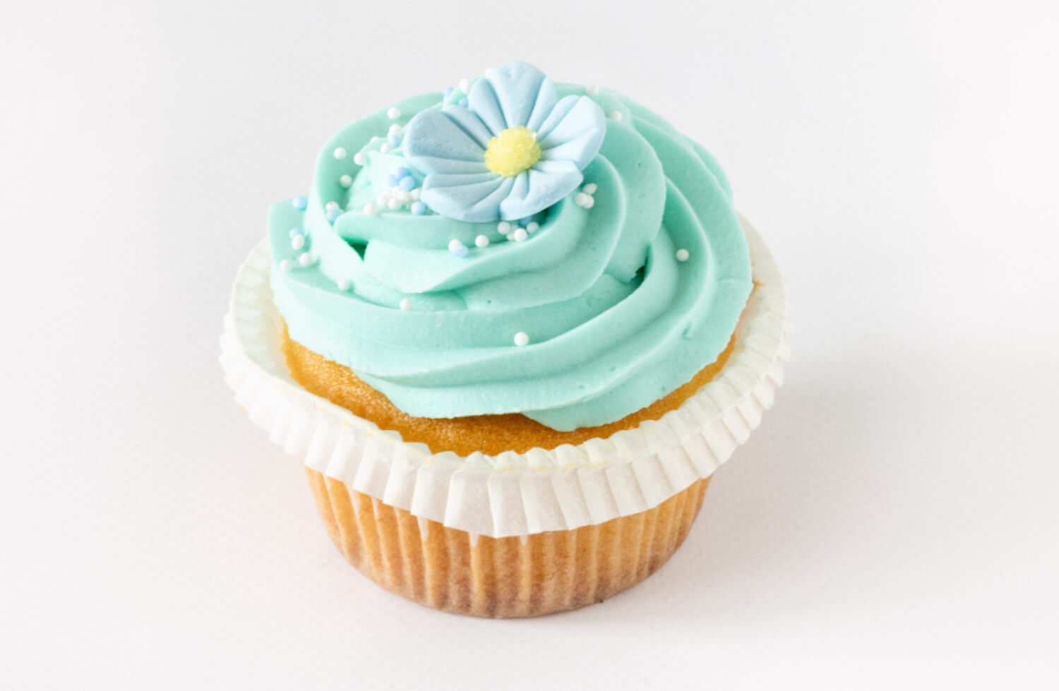 Baker Brun & Solbrød - Vaniljecupcake med blå blomst