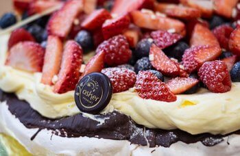 Den Glade Baker - Pavlova 16- 18 biter