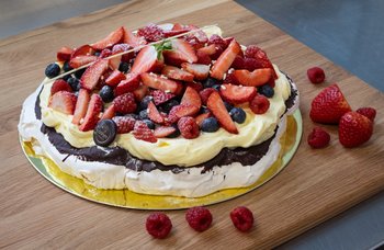 Den Glade Baker - Pavlova 16- 18 biter